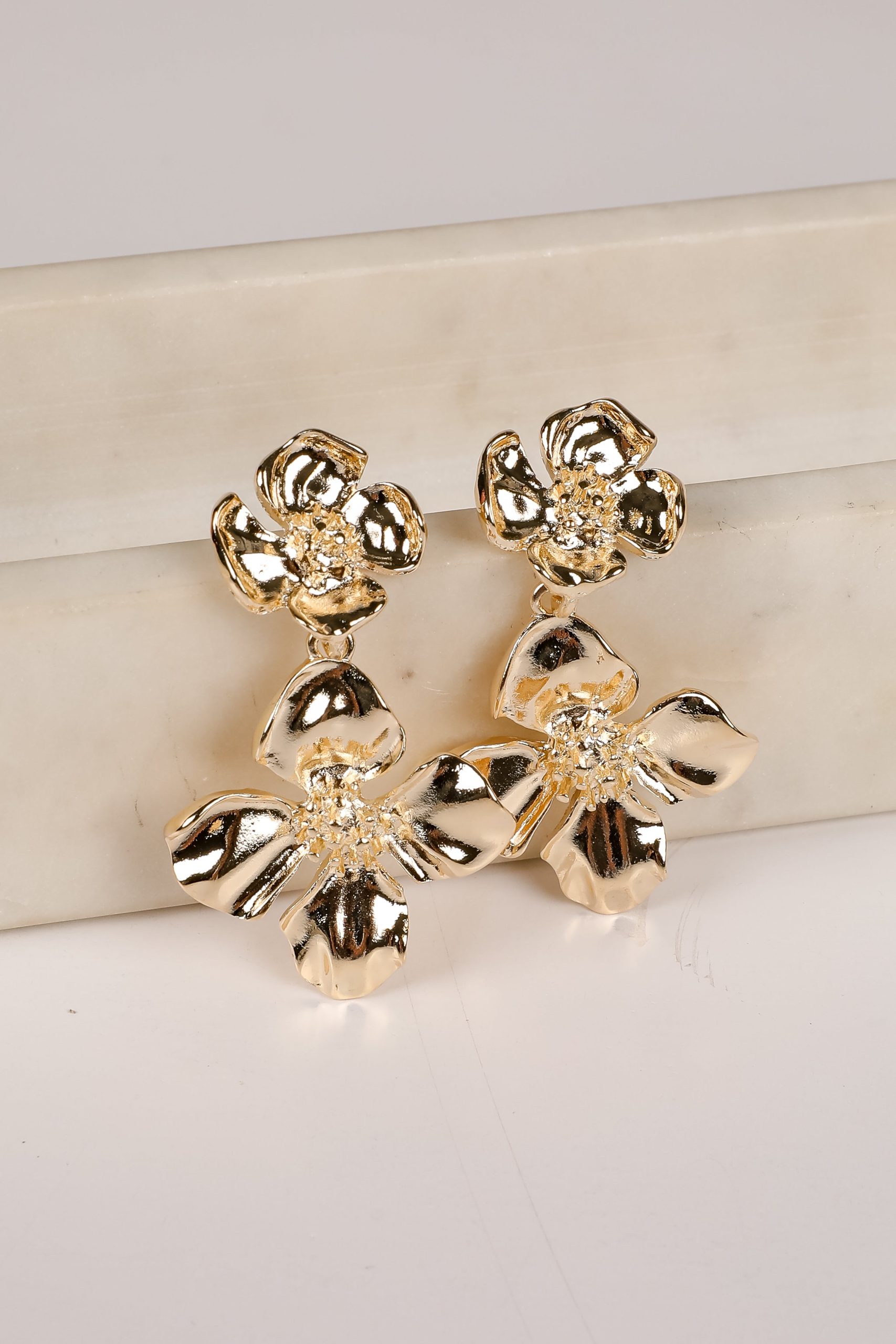 shopdressup_gold_flower_drop_earrings-2_f2d0828d-972e-4f85-a9cd-392856978324.jpg